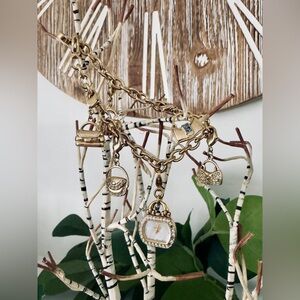 Citizen Women's EG2312-65D Silhouette Charm Bracelets Eco-Drive Gold-Tone Watch